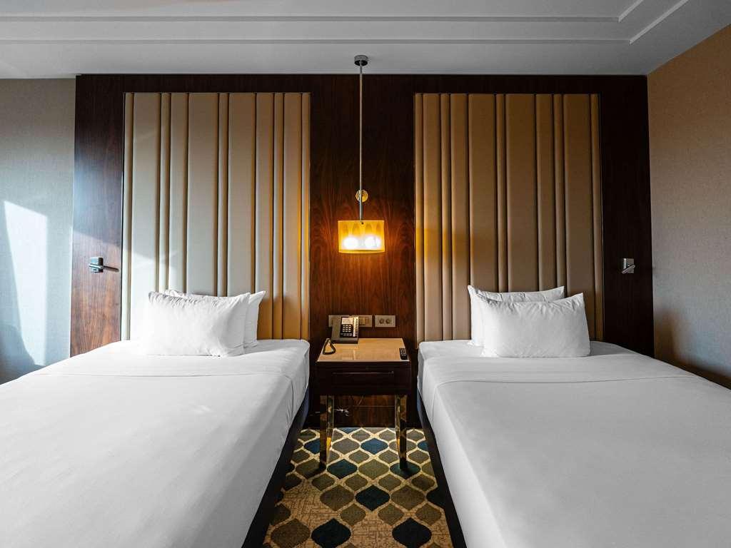 Moevenpick Hotel Taschkent Zimmer foto
